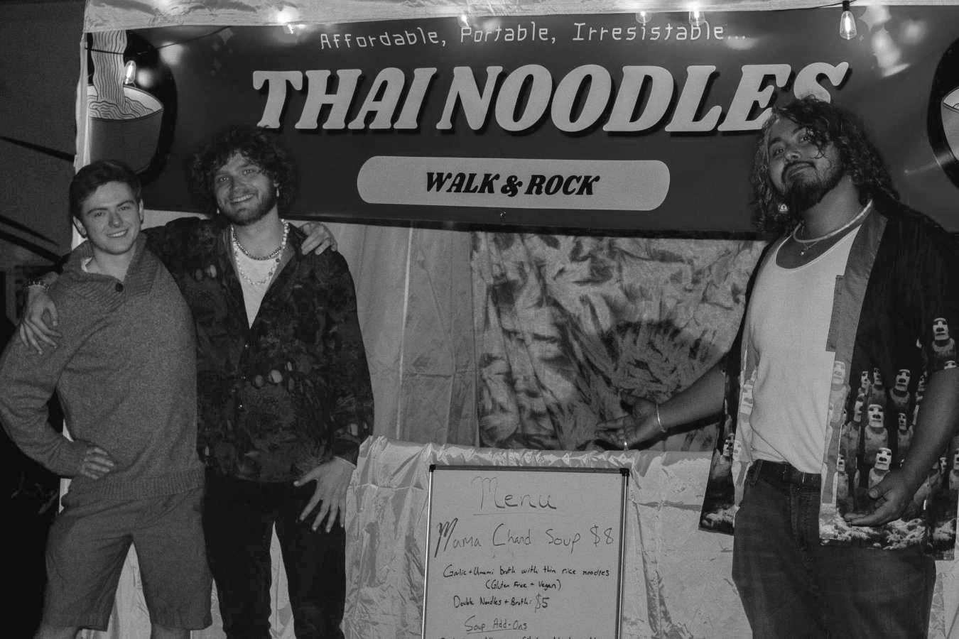 Vendors Standing in front of tent, Black & White